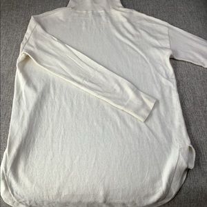 White turtleneck knit tunic